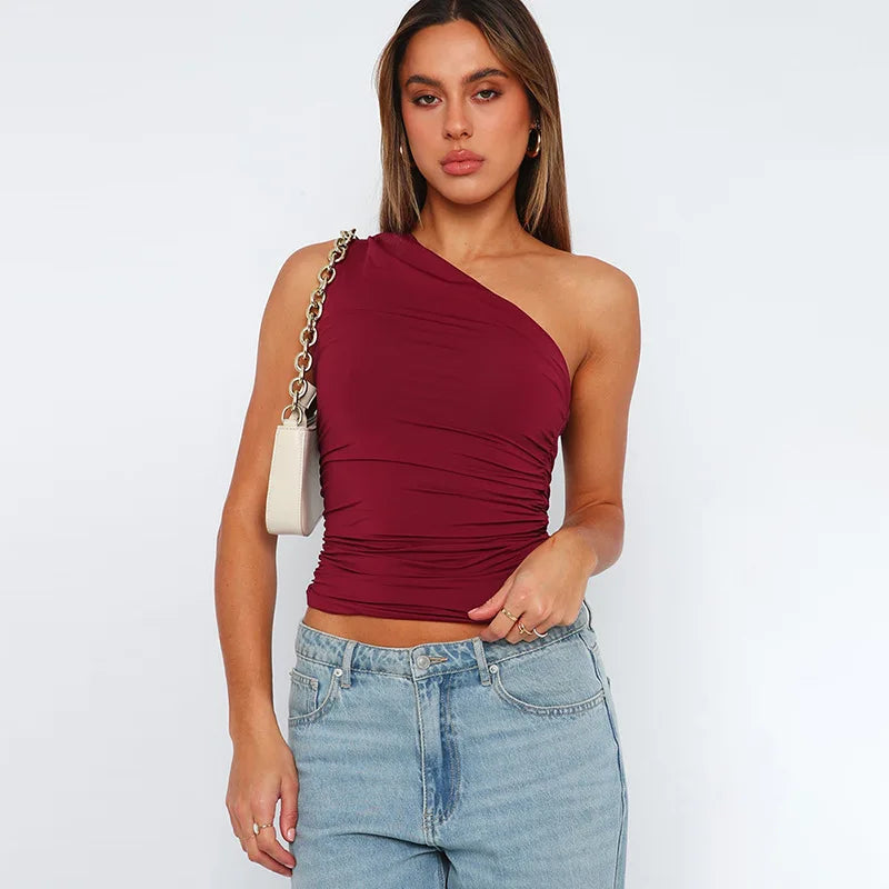BIDIJONES one-shoulder-topp dam med öppen rygg – enfärgad, S–L