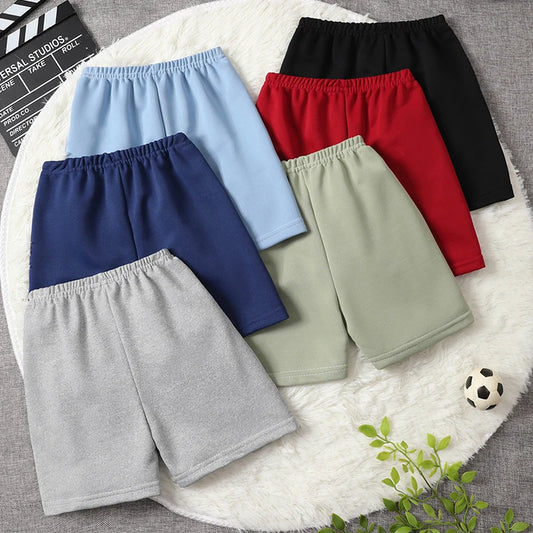 Enfärgade barnshorts med dragsko och elastisk midja