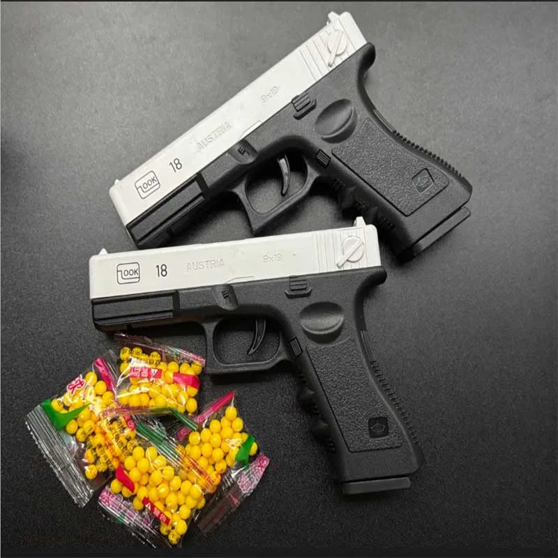 Mjukgummikula Airsoft Pistol Manuell G18 Leksakspistol med Magasin och Laser