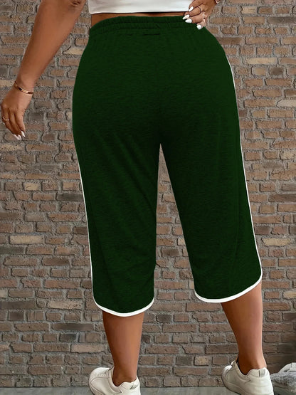 Plus size women's contrasting comfortable stretch cropped pants with solid color functional pockets, medium stretch, suitable fo