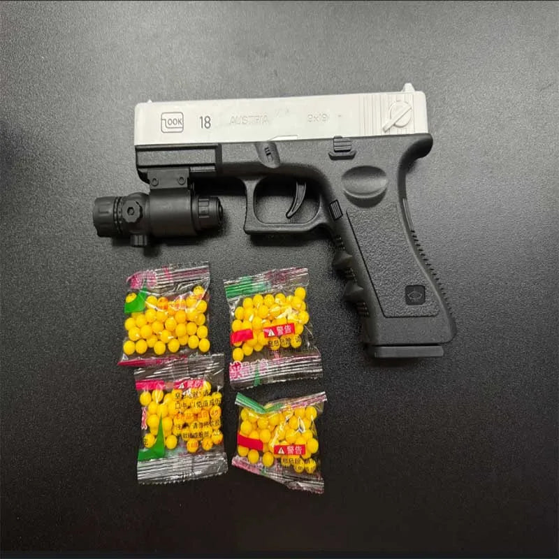 Mjukgummikula Airsoft Pistol Manuell G18 Leksakspistol med Magasin och Laser