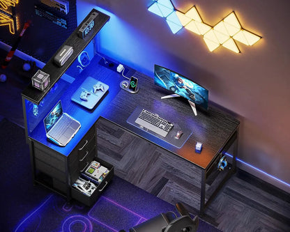 Coleshome L-Shaped Gaming Desk with 4 Drawers, 130X100Cm Gamer Desk with Led and Plugs, Corner Desk Gaming Table with Shelf for Home Office Games, Black