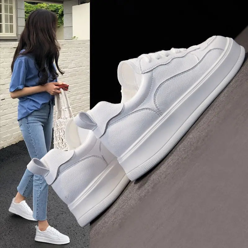 Vita sneakers i äkta läder för dam – minimalistisk design