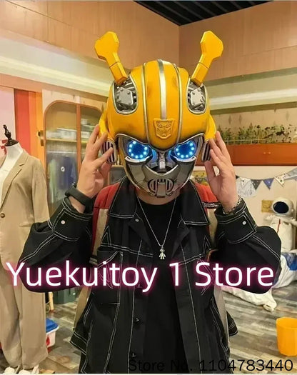 Bärbar Bumblebee hjälmleksak med armkanon och rollspelsdesign