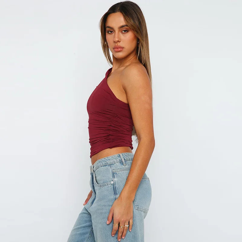 BIDIJONES one-shoulder-topp dam med öppen rygg – enfärgad, S–L