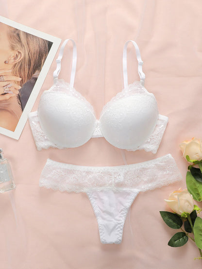 Hot selling women's sexy embroidered lace bra set with steel ring gathering push up and seamless thong set B6064