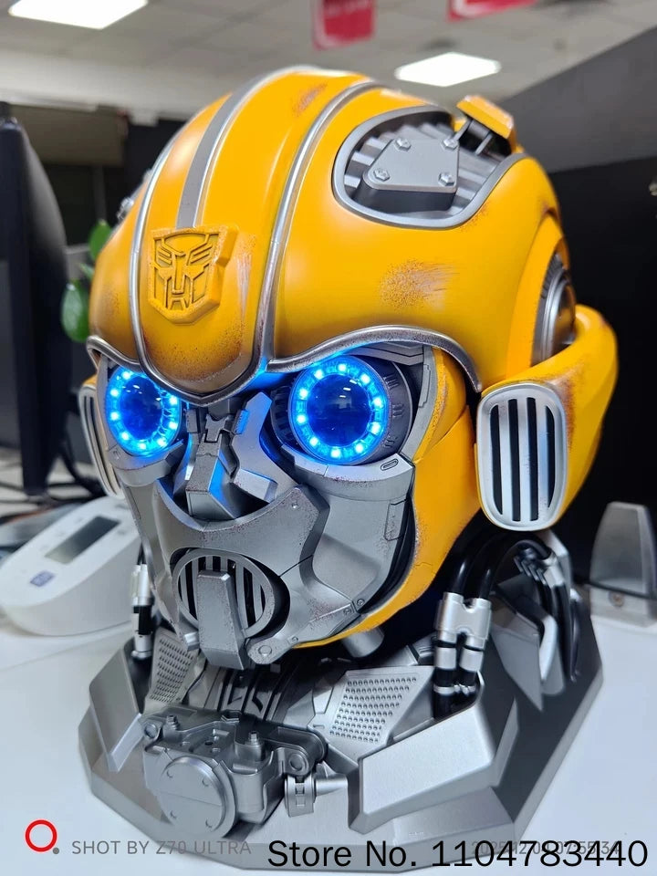 Bärbar Bumblebee hjälmleksak med armkanon och rollspelsdesign