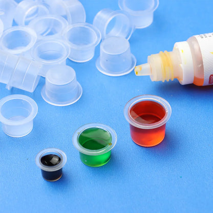 100Pcs Tattoo Ink Caps Disposable Plastic Cups Body Art Tattoo Pigment Cups Container Holder Stand Makeup Tattoo Supplies L/M/S