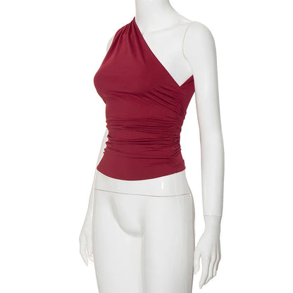 BIDIJONES one-shoulder-topp dam med öppen rygg – enfärgad, S–L