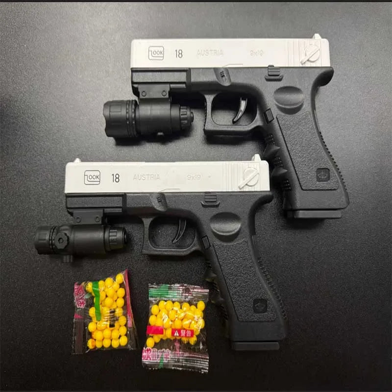 Mjukgummikula Airsoft Pistol Manuell G18 Leksakspistol med Magasin och Laser