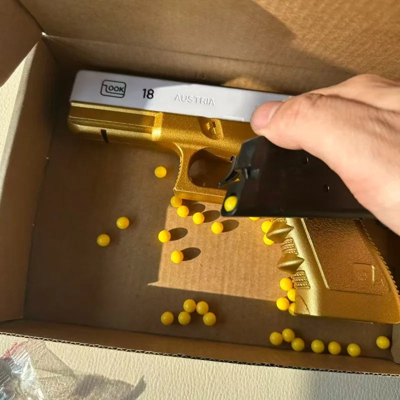 Vit och guld leksakspistol för mjuka skott med infrarött sikte